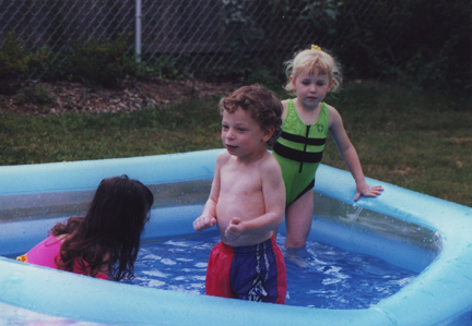 Louis in the pool w Cousin Lauren & Friend