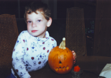 Louis & Pumpkin w lit candle inside