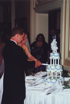 Andrew & Sarah Cutting The Cake