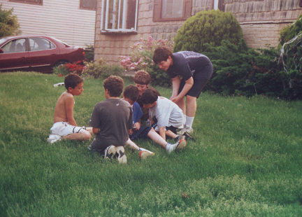 Louis on the grass in front w  (from left) Justin M,  Blase S, Branden S, Drew F & Henry L